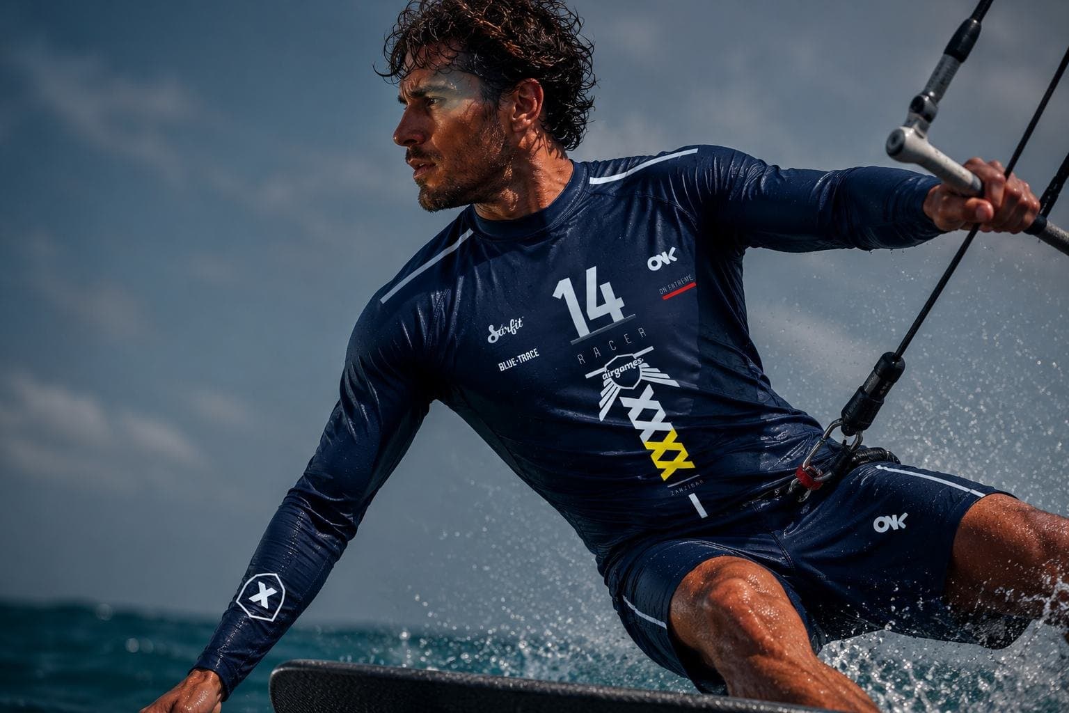 ONX athlete kitesurfing in the Racer 2026 signature wetshirt